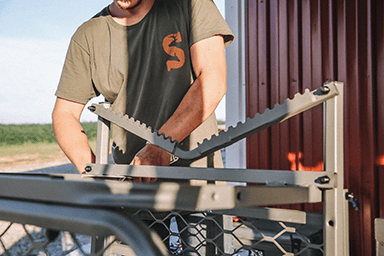 Man Working on Treestand 